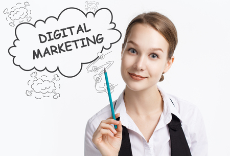 The concept of business, technology, the Internet and the network. A young entrepreneur working on a virtual screen of the future and sees the inscription: Digital Marketingの写真素材