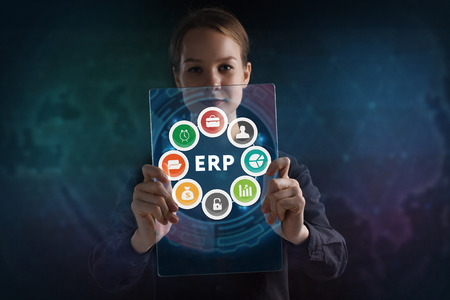 The concept of business, technology, the Internet and the network. A young entrepreneur working on a virtual screen of the future and sees the inscription: ERPの写真素材