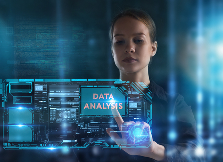 The concept of business, technology, the Internet and the network. A young entrepreneur working on a virtual screen of the future and sees the inscription: Data analysisの写真素材