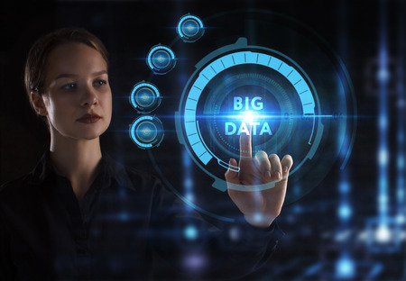 The concept of business, technology, the Internet and the network. A young entrepreneur working on a virtual screen of the future and sees the inscription: Big dataの写真素材