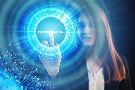 The concept of business, technology, the Internet and the network. A young entrepreneur working on a virtual screen of the future and sees the inscription: Customizationの写真素材