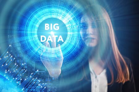 The concept of business, technology, the Internet and the network. A young entrepreneur working on a virtual screen of the future and sees the inscription: Big dataの写真素材