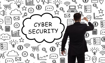 Business, technology, internet and networking concept. Young entrepreneur showing keyword: Cyber securityの写真素材