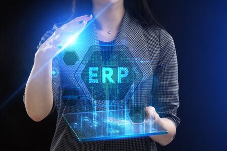 The concept of business, technology, the Internet and the network. A young entrepreneur working on a virtual screen of the future and sees the inscription: ERPの写真素材