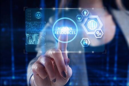 Business, Technology, Internet and network concept. Young businessman working on a virtual screen of the future and sees the inscription: の写真素材