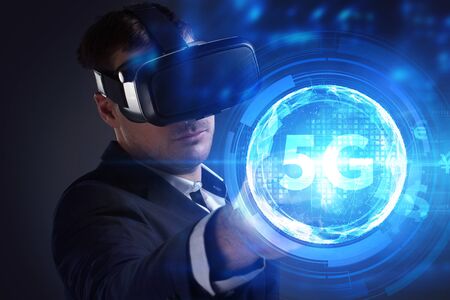 Business, Technology, Internet and network concept. Young businessman working on a virtual screen of...