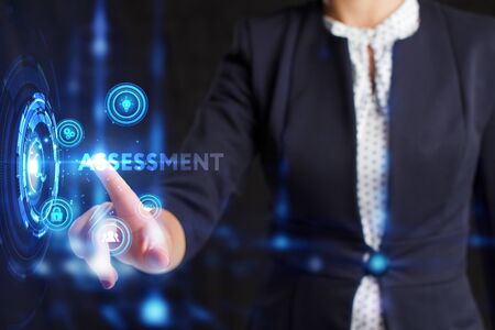 Business, Technology, Internet and network concept. Young businessman working on a virtual screen of the future and sees the inscription: の写真素材
