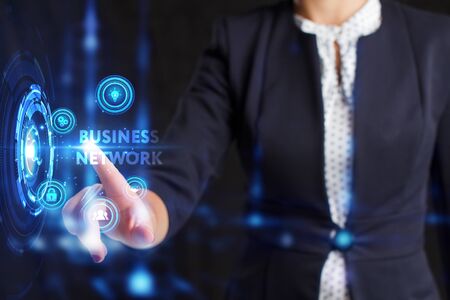 Business, Technology, Internet and network concept. Young businessman working on a virtual screen of the future and sees the inscription:の写真素材