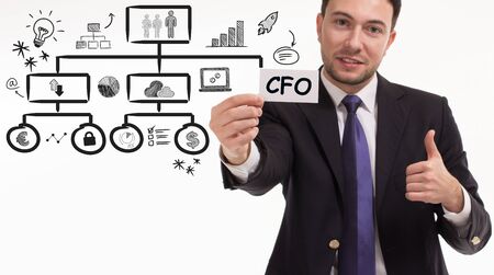 Business, technology, internet and network concept. Young businessman thinks over the steps for successful growth: CFOの写真素材