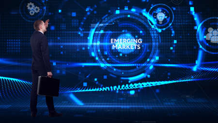 Business, technology, internet and network concept. Young businessman thinks over the steps for successful growth: Emerging marketsの写真素材