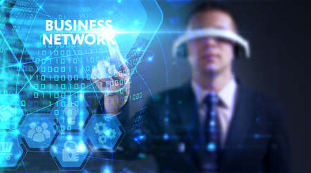 Business, technology, internet and network concept. Young businessman thinks over the steps for successful growth: Business networkの写真素材