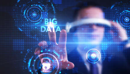 Business, technology, internet and network concept. Young businessman thinks over the steps for successful growth: Big dataの写真素材