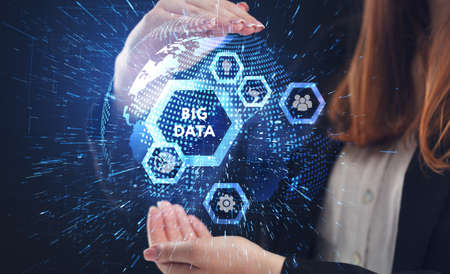 Business, Technology, Internet and network concept. Young businessman working on a virtual screen of the future and sees the inscription: Big dataの写真素材