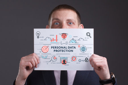 Business, technology, internet and network concept. Young businessman thinks over the steps for successful growth: Personal data protectionの写真素材