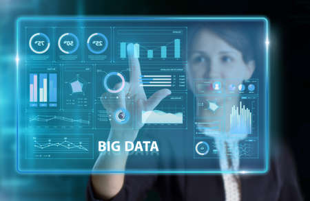 Business, Technology, Internet and network concept. Young businessman working on a virtual screen of the future and sees the inscription: Big dataの写真素材