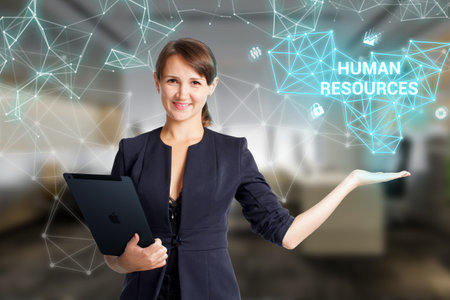 Business, Technology, Internet and network concept. Young businessman working on a virtual screen of the future and sees the inscription: Human resourcesの写真素材