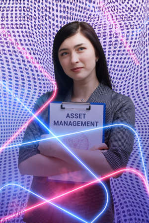 Business, technology, internet and network concept. Young businessman thinks over the steps for successful growth: Asset managementの写真素材