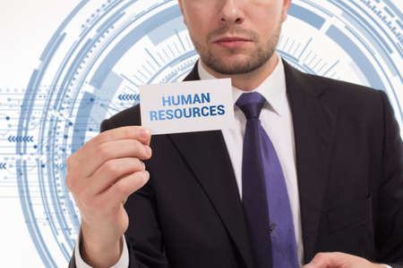 Business, technology, internet and network concept. Young businessman thinks over the steps for successful growth: Human resourcesの写真素材