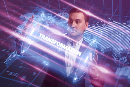 Business, Technology, Internet and network concept. Young businessman working on a virtual screen of the future and sees the inscription: Transformationの写真素材