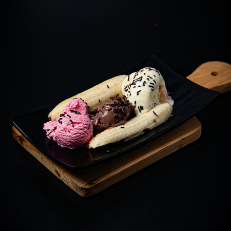 Banana split with chocolate sprinkles on topの写真素材