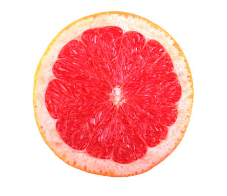 Fresh juicy grapefruit, isolated on a white background, close-up. Half of fresh pink grapefruit. Ripe, juicy, fresh, organic slice of grapefruit. Half an appetising grapefruit.の写真素材