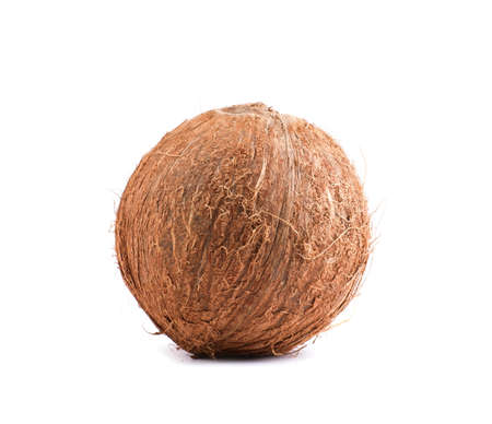 Natural, organic, fresh, tropical coconut, isolated on a white background. Close bright brown coconut. Healthful lifestyle. Hawaiian coconuts. Freshness, nature, summer concept.の写真素材