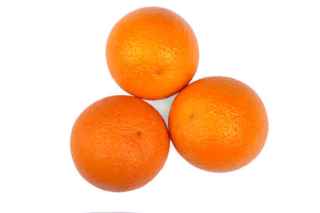 Incredibly delicious, juicy, ripe, healthy citrus fruits, isolated on a white background. Tasty, exotic, ripe, tropical and bright oranges concept. Nutritious  vitamins for breakfast.の写真素材