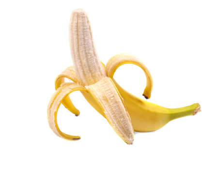 Close-up picture of peeled banana, isolated on a white background. Organic, fresh, sweet, ripe bright yellow banana. Tasty and juicy peeled banana. Healthy and nutritious vitamins.の写真素材