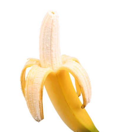 Fresh peeled banana, isolated on a white background. Vitamins. Tropical fruits. Fresh and tasty bananas. Half-peeled banana. Organic bananas. Tropical fruit concept.の写真素材