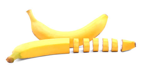 Bright yellow tasty bananas isolated over the white background. Beautiful juicy colorful banana. Exotic tropical fruits full of vitamins. Organic vegetarian meals.の写真素材