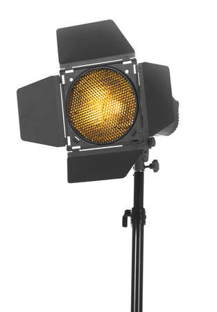 Close-up of black studio lighting on a tripod stand, isolated on the white background. Photo-studio with lighting equipment. The photo of the honeycomb is glowing.の写真素材