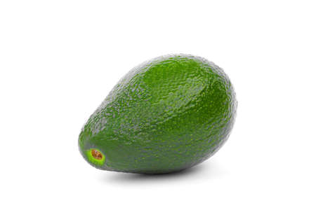 A single whole saturated light green avocado isolated over the white background. A colorful and...