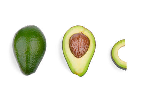 A group of three fresh avocados, isolated on a white background. Organic vegetables. Healthful...