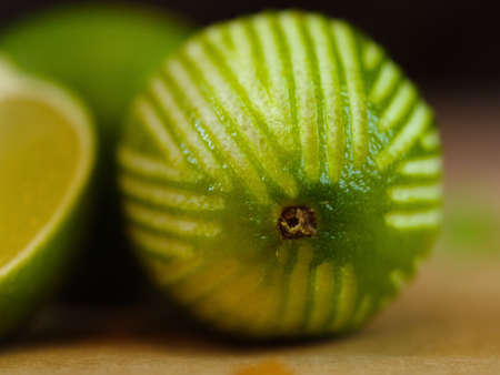 Close-up of a beautifully cut lime. Fresh, juicy, raw, sour limeの写真素材