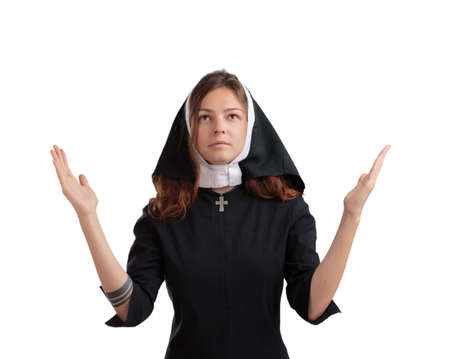 Pretty young nun in religion concept isolated on a white background.の写真素材