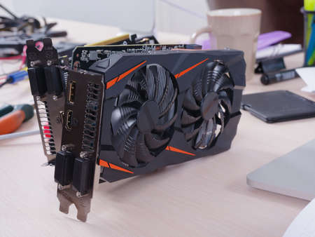 Close-up of a video card in the office on the desk.