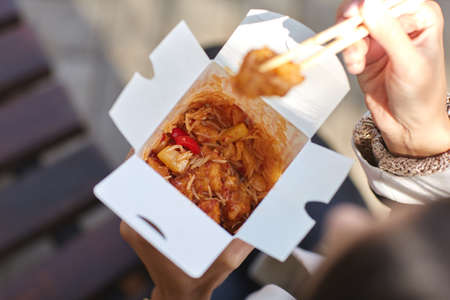 Chinese noodles in box with shrimp, vegetables and sesame with soy sauce. Food concept.の写真素材