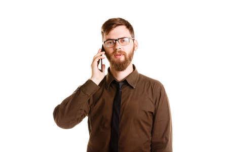 Handsome young man posing in the studio isolated on a white background.