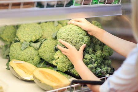 Fruit market with various colorful fresh fruits and vegetables. Food concept.の写真素材