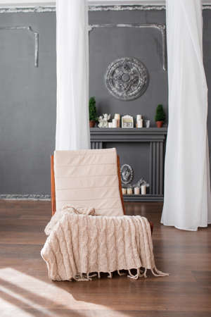 Rocking chair in a room with a good interiorの写真素材