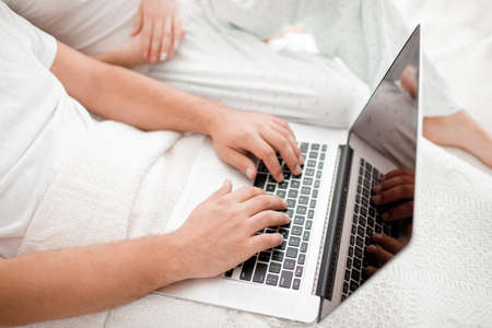 A top view on modern laptop in bedroom on a white background.