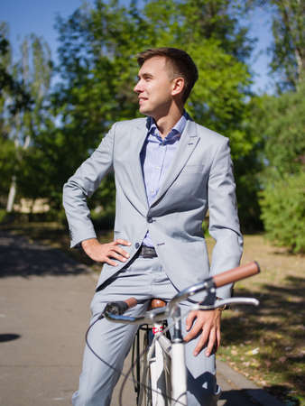 The guy sits on his bike and does not go anywhereの写真素材