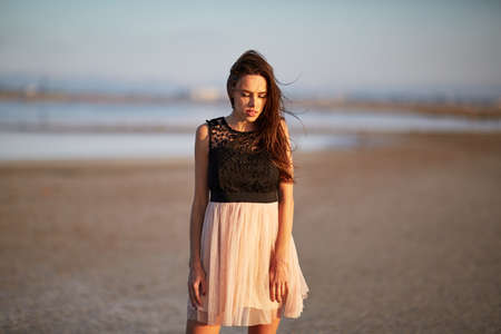 Sexy sensual girl on a natural background. Woman on a countryside vacation concept. Copy space.の写真素材