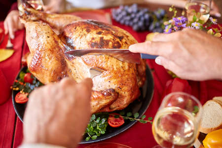 Tasty baked chicken on vegetables pillow. Ready for holidays table. Close-up of delishious chicken with vegetables. Food concept.の写真素材