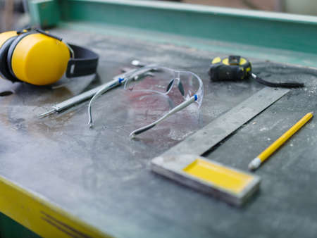 Tools carpenter close-up on a gray background tableの写真素材