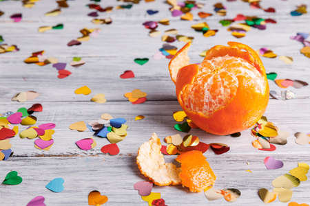 Purified orange on a gray wooden floor with sparklesの写真素材
