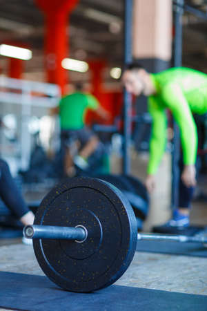 A barbell close up in the gym. The concept of sport.の写真素材