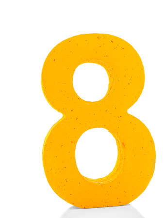 Bright yellow number eight for the New Years decoration isolated on a white background.