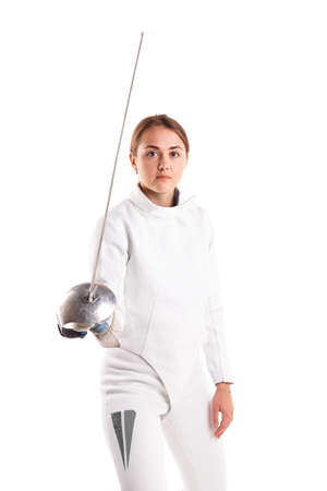 Girl fencer stands on white isolated background with sword