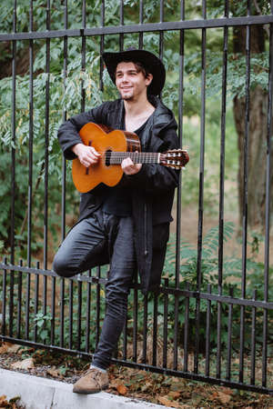 Play guitar in park
